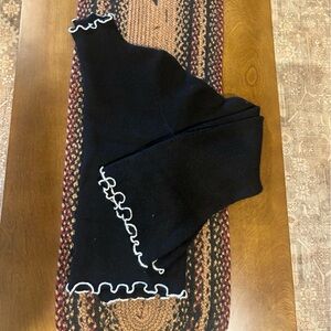 Black Turtleneck with ruffle Trim